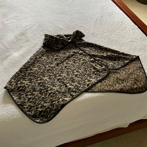 Fleece Leopard Print Poncho with nonfunctional large wood buttons.
